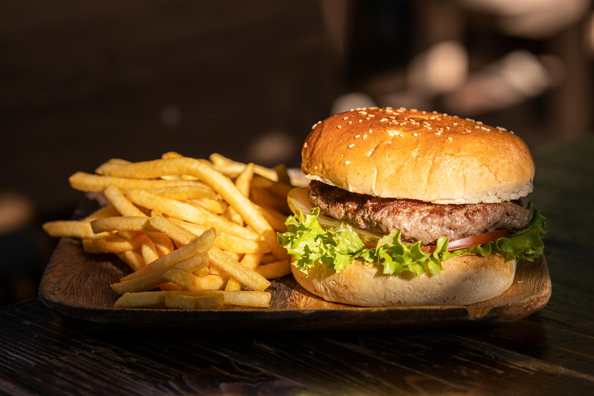 a photo of burgers and fries